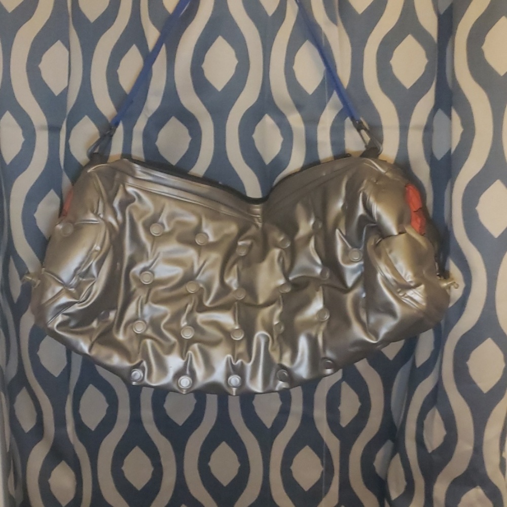 Vintage parachuting penguin blow up duffle